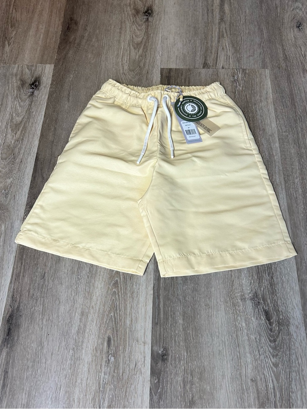 Kid’s Drawstring Swim Shorts in Pale Yellow - Picture 6 of 10